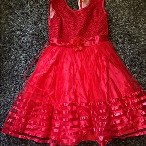 Red Sleeveless Dress with Floral Accent